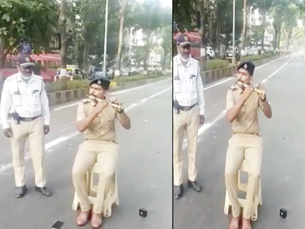 बीच सड़क पर पुलिस वाले ने संदेशे आते हैं की धुन को बांसुरी के जरिए बजाता हुआ आ रहा नजर – वीडियो वायरल!